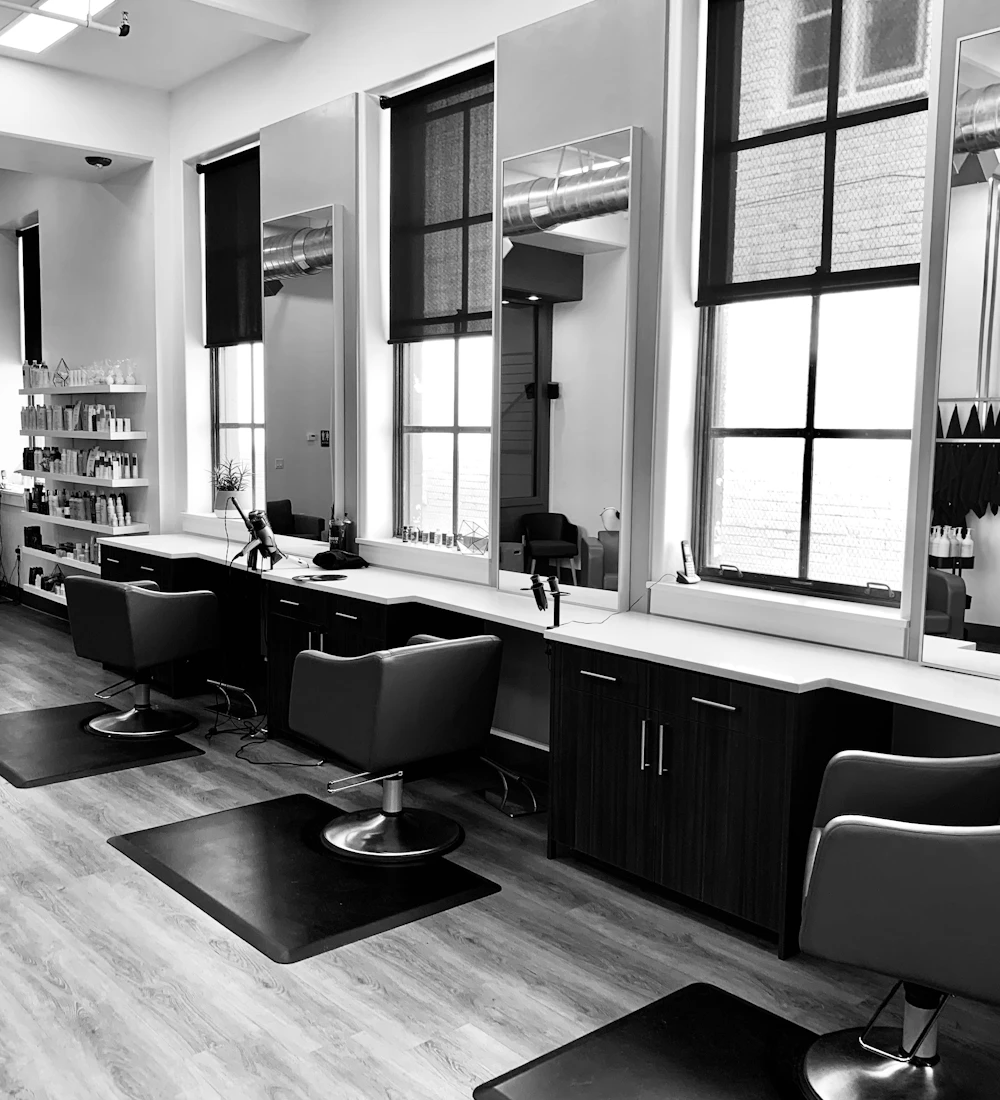 A light-filled salon with individual styling stations